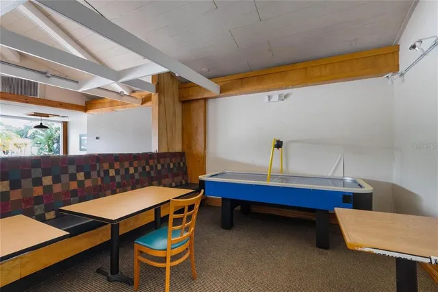 a room with chair and table