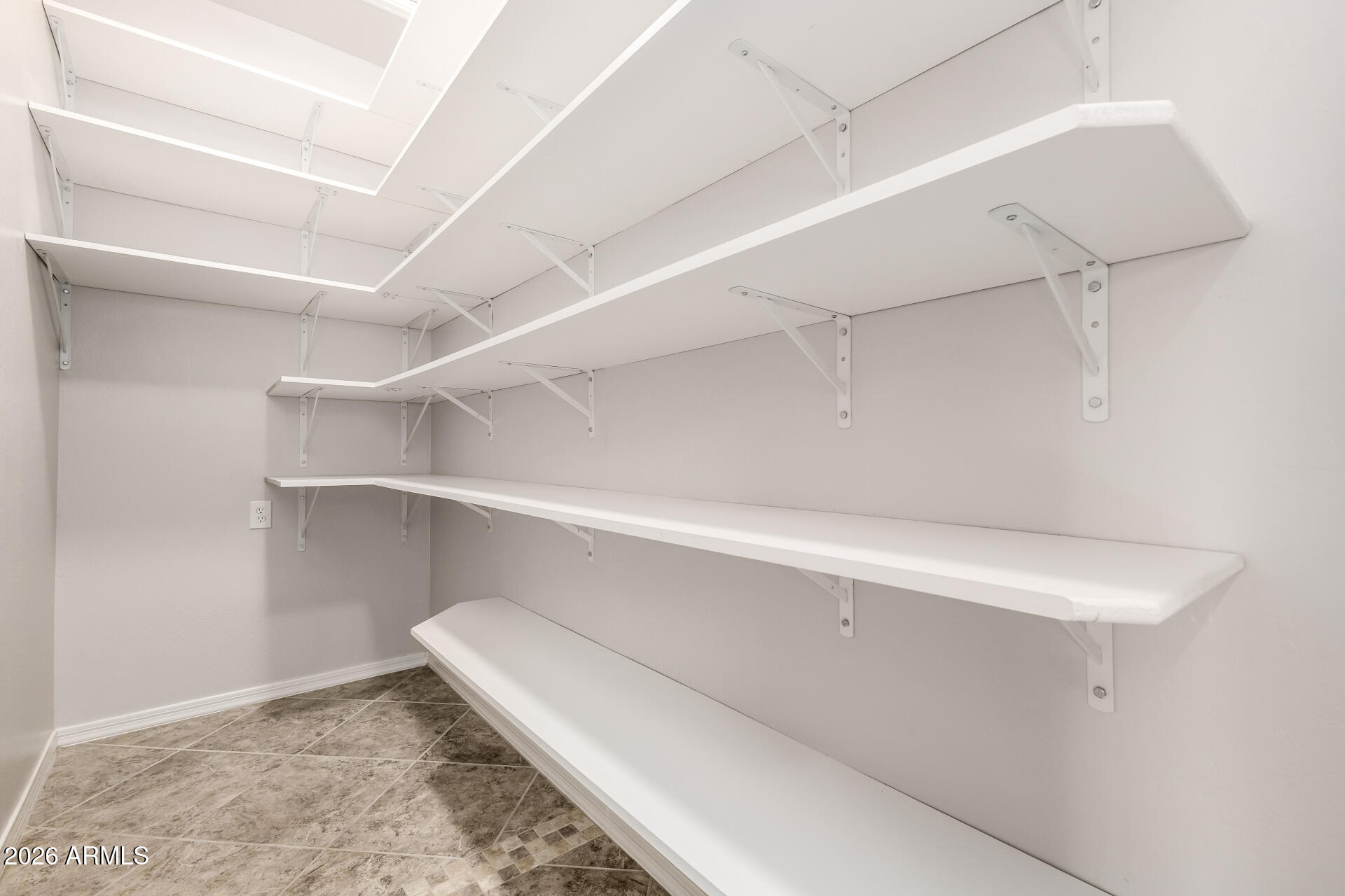 27119 West Burnett Road Buckeye, AZ 85396 - Photo 22 of 56 a view of an empty walk in closet