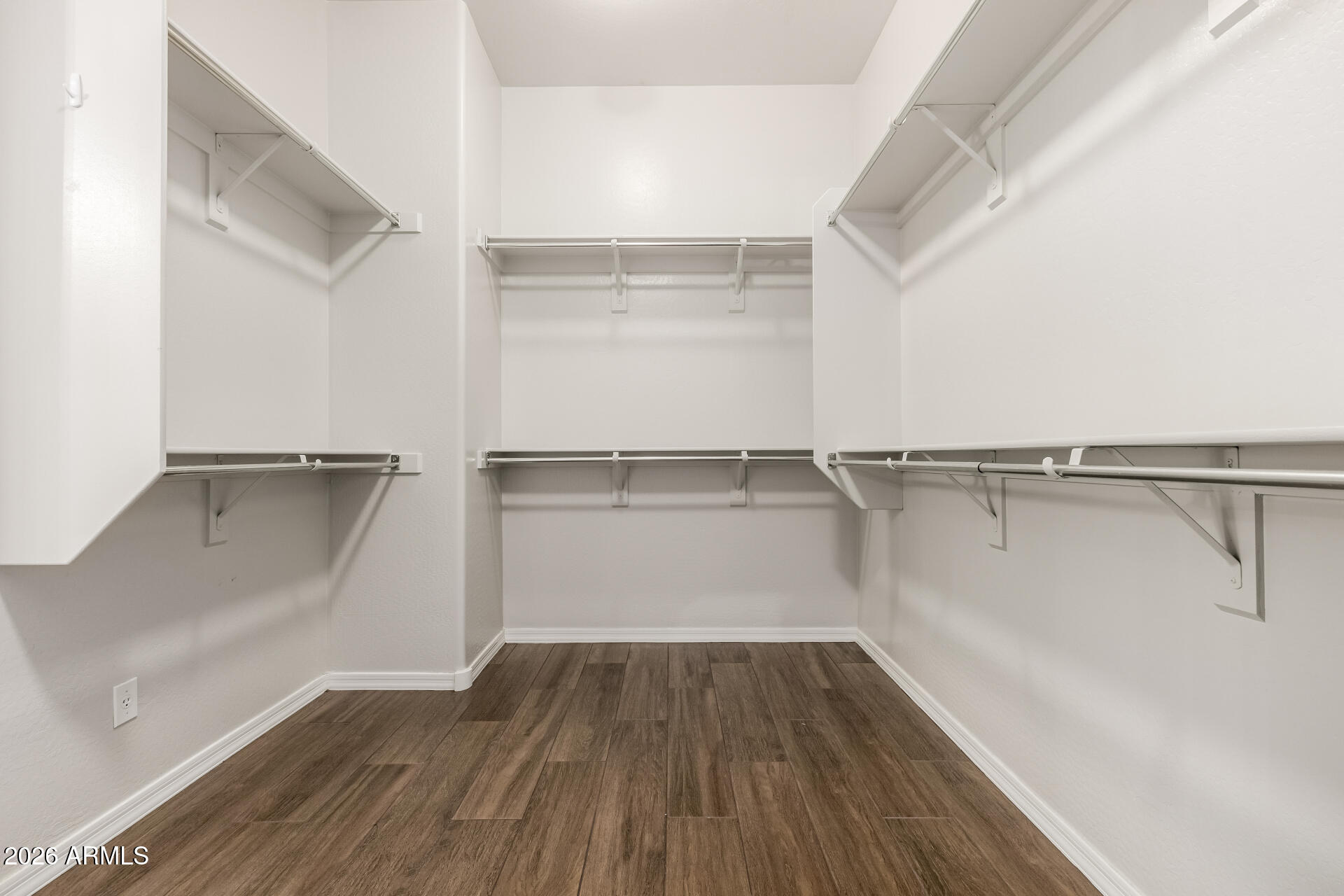27119 West Burnett Road Buckeye, AZ 85396 - Photo 29 of 56 a view of a room with wooden floor
