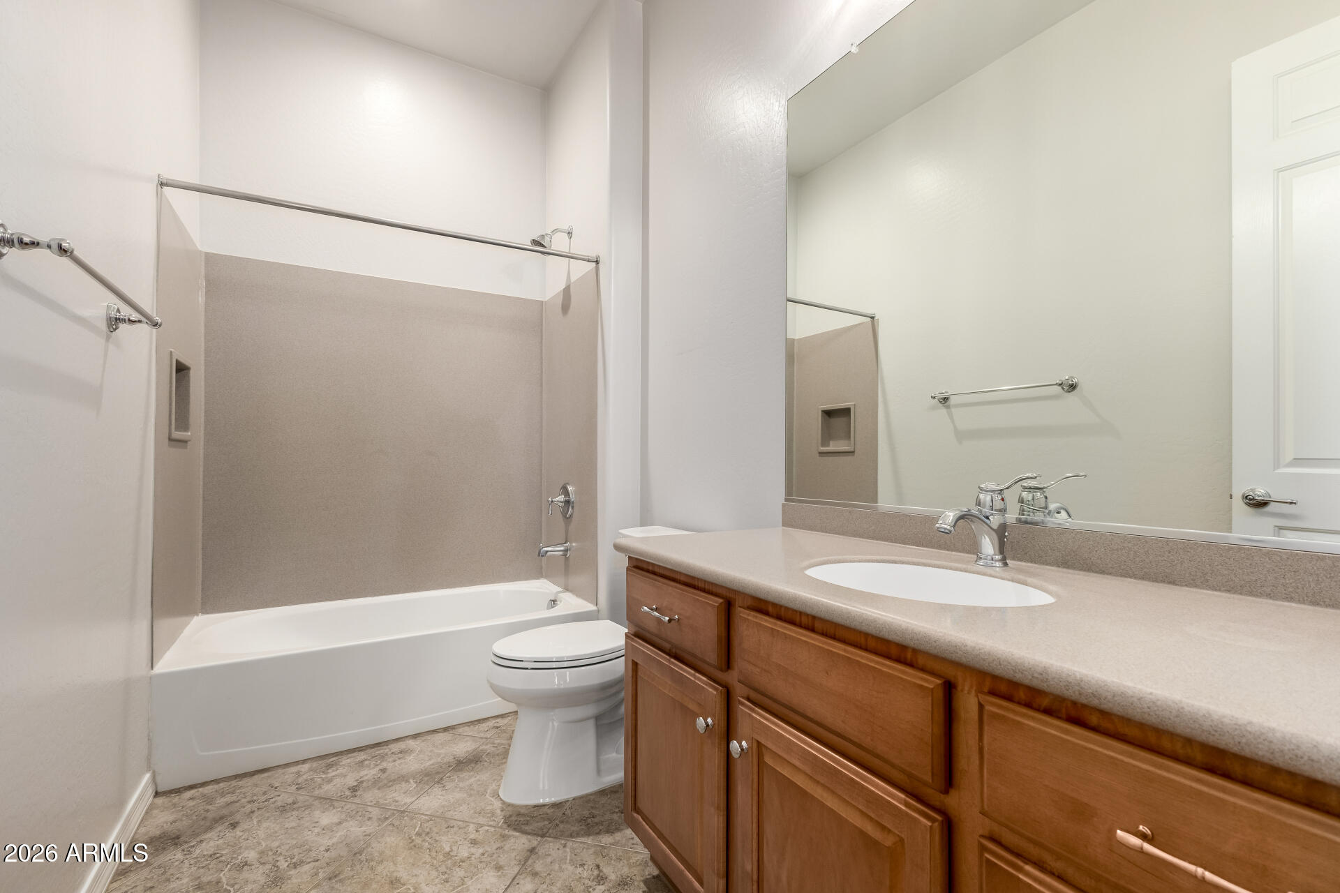 27119 West Burnett Road Buckeye, AZ 85396 - Photo 32 of 56 a bathroom with a sink a toilet and shower