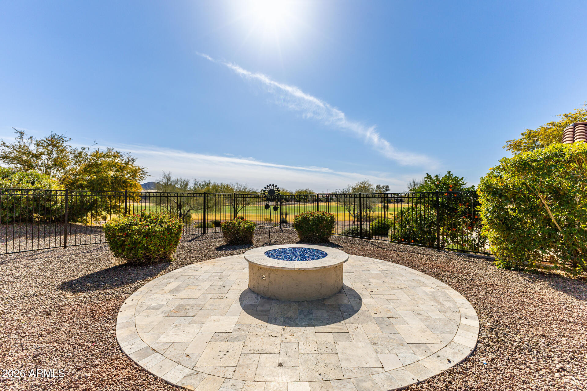 27119 West Burnett Road Buckeye, AZ 85396 - Photo 39 of 56 a view of a swimming pool with a chairs