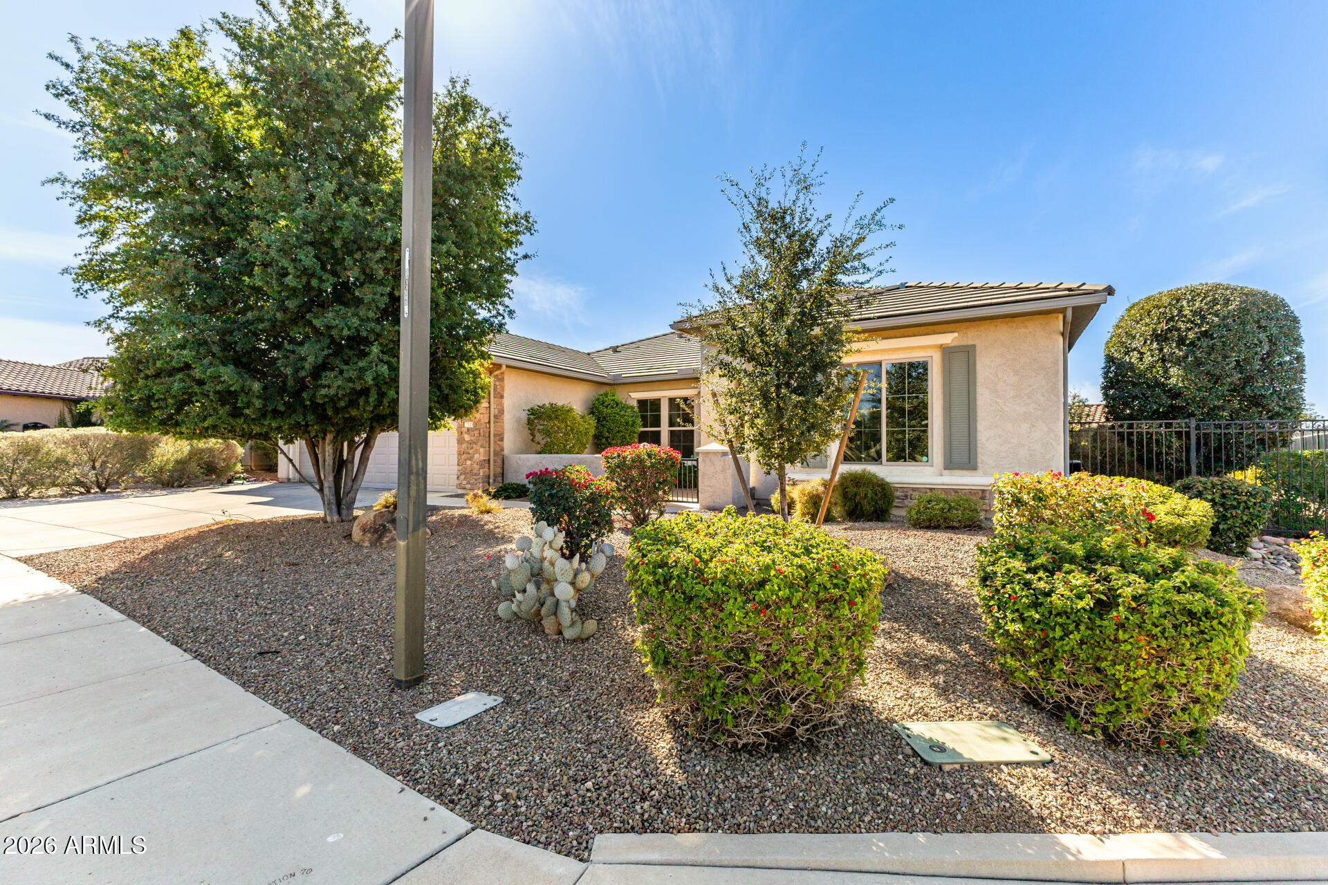 27119 West Burnett Road Buckeye, AZ 85396 - Photo 5 of 56 a view of a house with backyard and sitting area