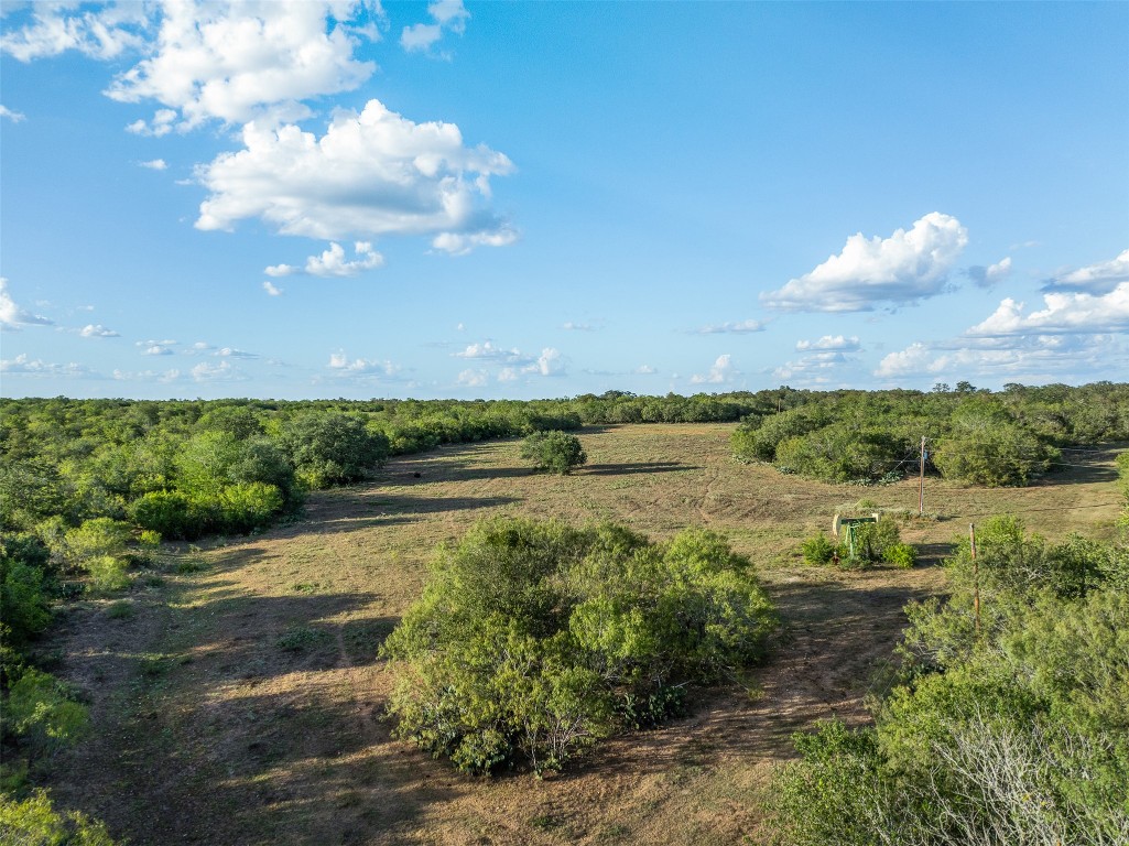 a view of lake with green space
