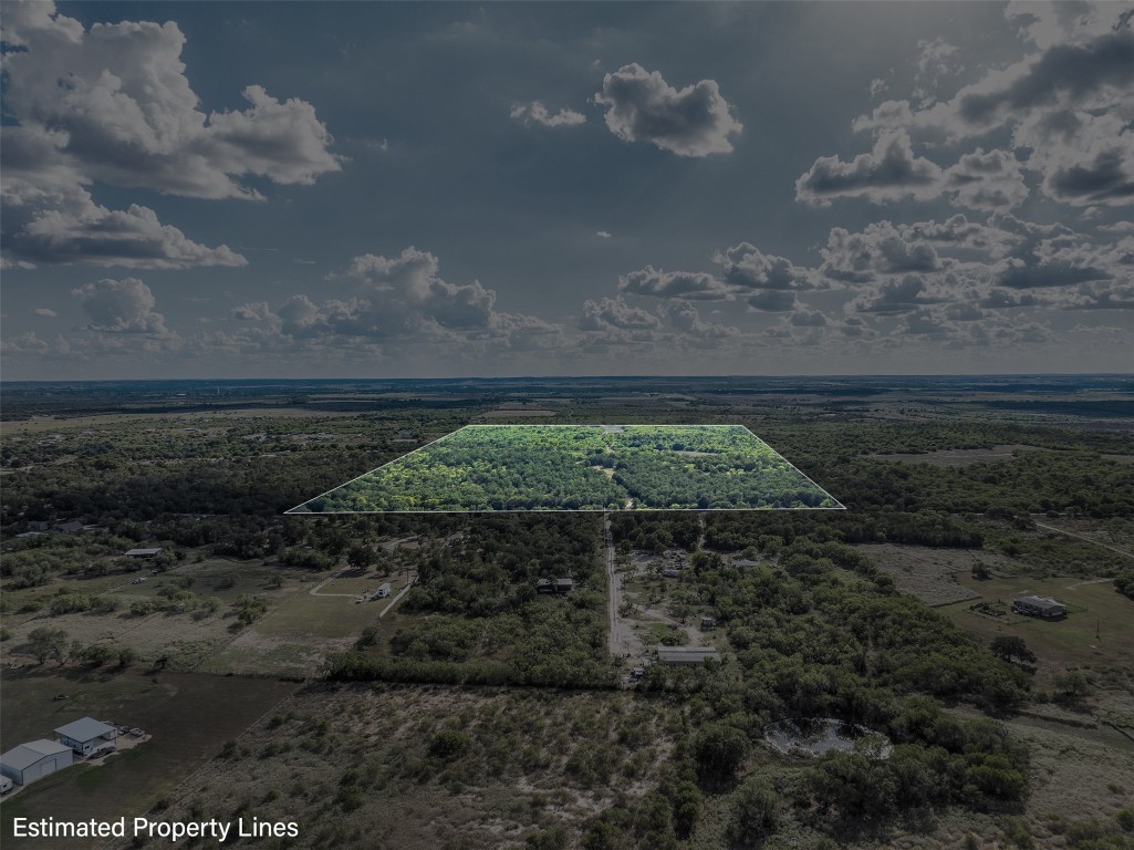 399 Seals Creek Road Lockhart, TX 78644 - Photo 36 of 40 a backyard of a house