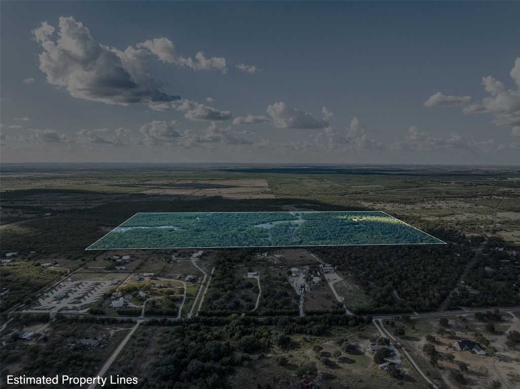 399 Seals Creek Road Lockhart, TX 78644 - Photo 40 of 40 a view of a backyard of the house