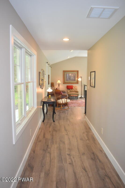 549 Finn Swamp Road Lakeville, PA 18438 - Photo 19 of 35 a view of a livingroom with furniture and a window