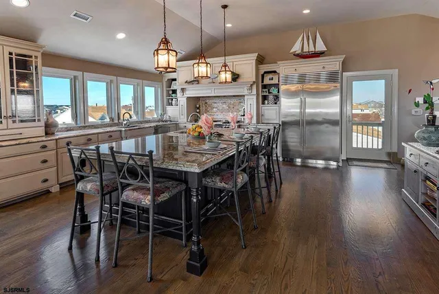 a view of a dining area with furniture window and wooden floor