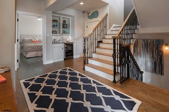 a view of entryway with wooden floor