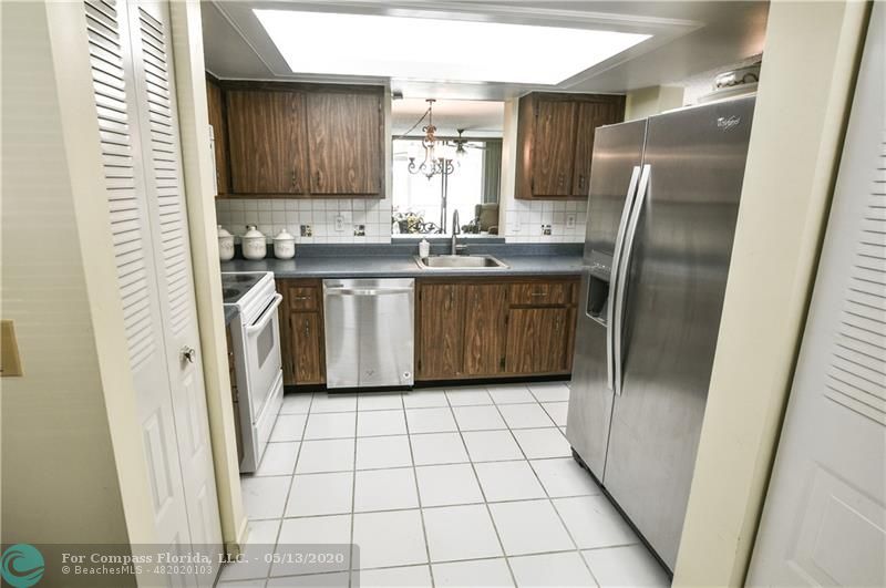 7350 Northwest 18th Street, Unit 101 Margate, FL 33063 - Photo 12 of 28 Spacious kitchen for all your cooking needs! Newer stainless dishwasher and refrigerator.