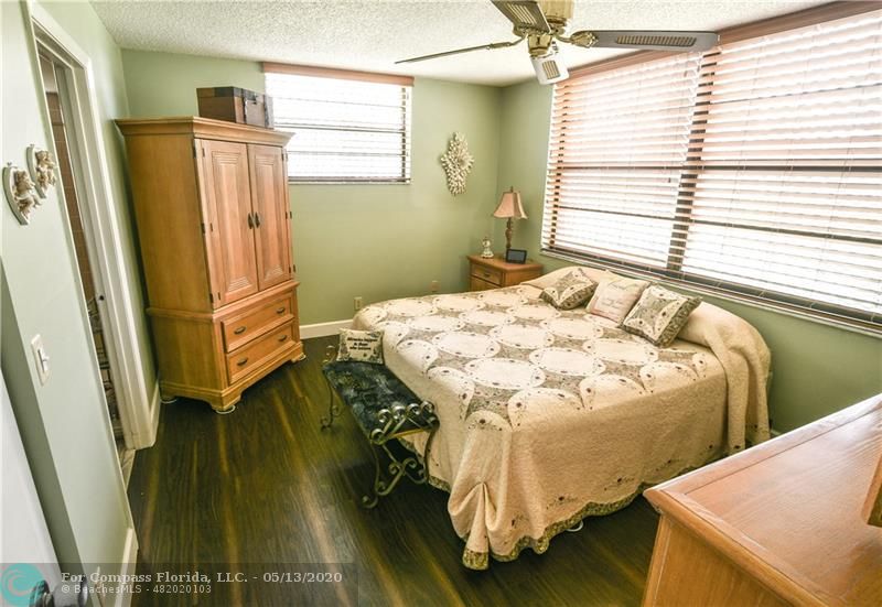 7350 Northwest 18th Street, Unit 101 Margate, FL 33063 - Photo 15 of 28 Large master bedroom easily accommodates a king sized bed. Two windows for extra sunshine!
