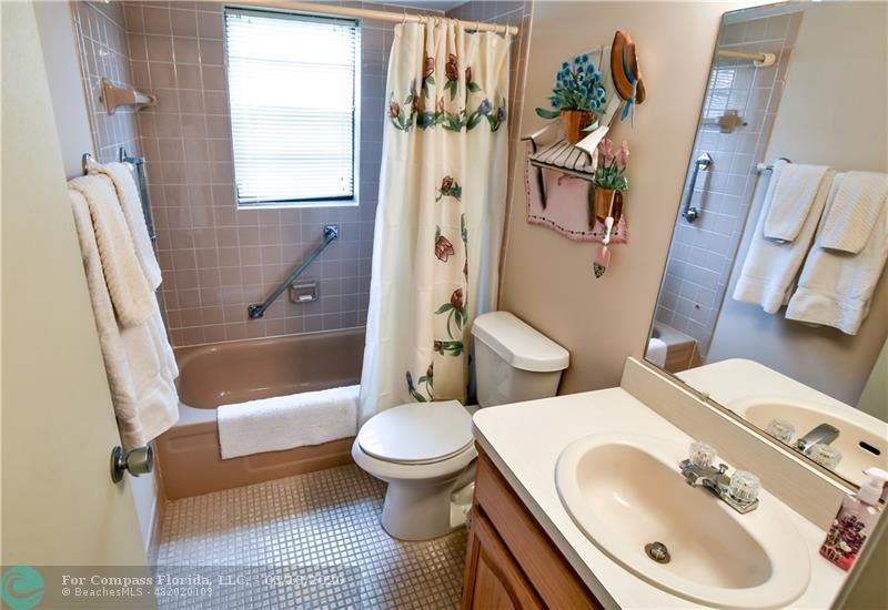 7350 Northwest 18th Street, Unit 101 Margate, FL 33063 - Photo 18 of 28 Guest bathroom.