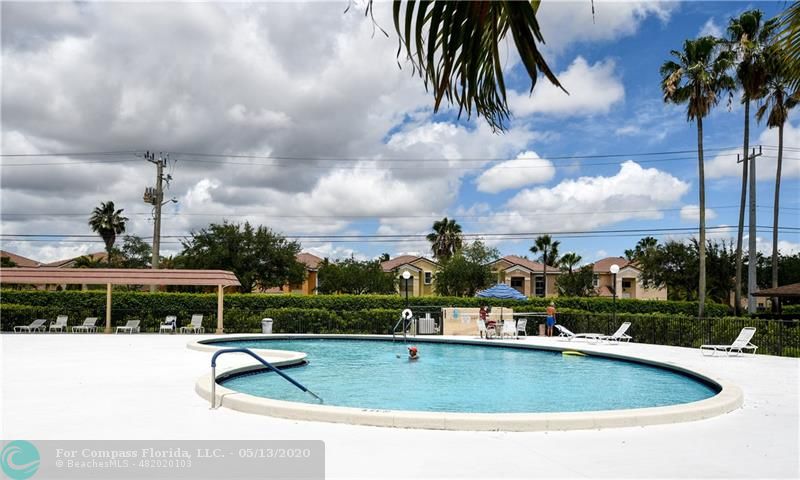 7350 Northwest 18th Street, Unit 101 Margate, FL 33063 - Photo 28 of 28 Spacious community pool.