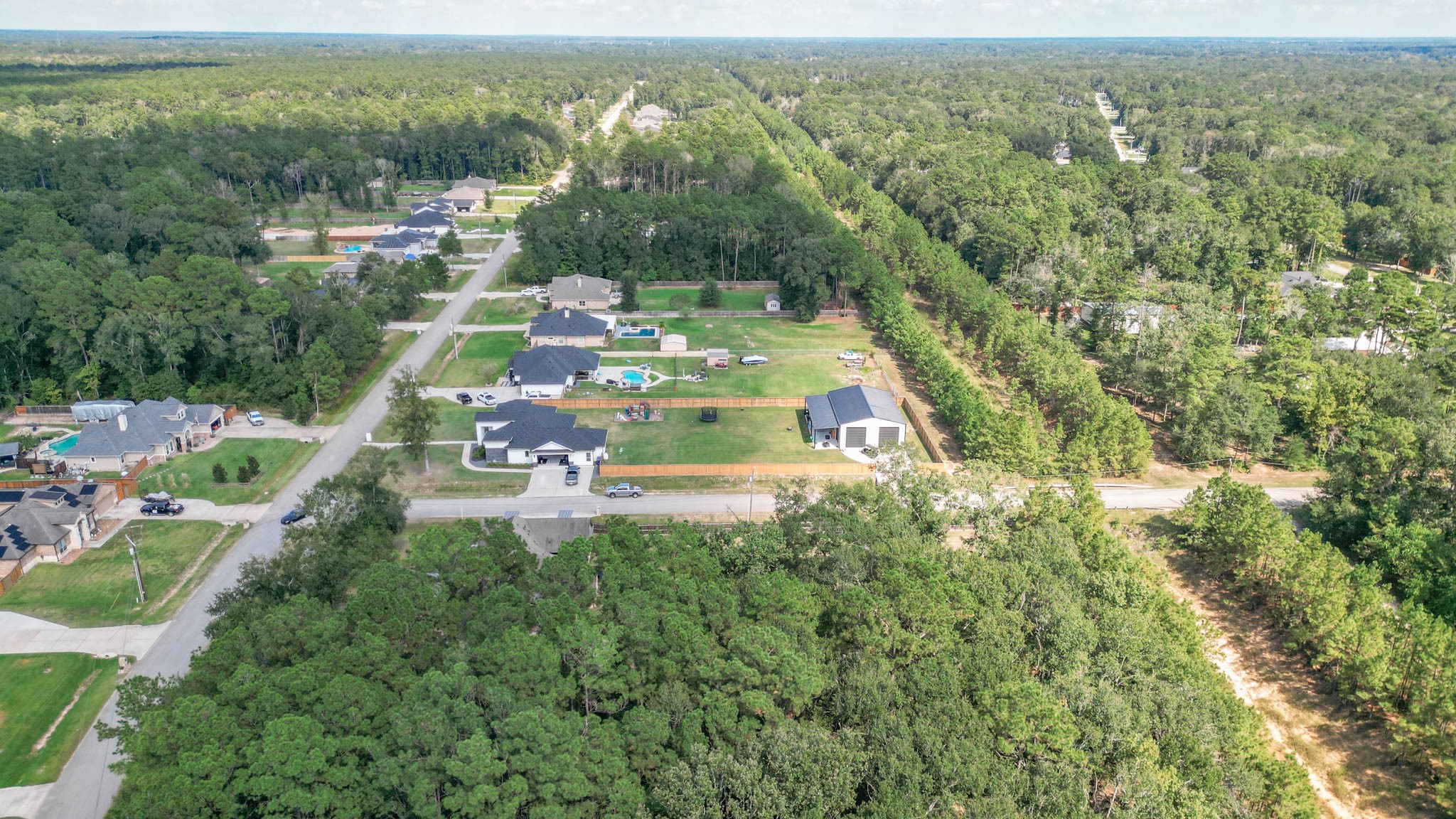 27538 Rio Blanco Drive Splendora, TX 77372 - Photo 18 of 18 an aerial view of residential houses with outdoor space and trees