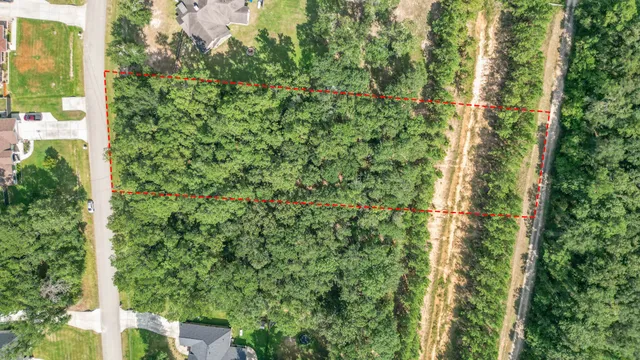 a view of a lake with a building in the background