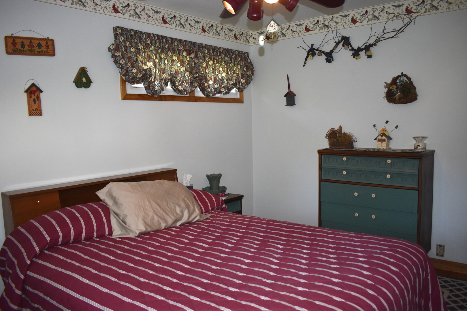 2845 River Road Kankakee, IL 60901 - Photo 17 of 26 a bedroom with a bed and painting on the wall