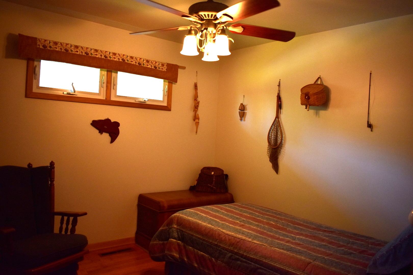2845 River Road Kankakee, IL 60901 - Photo 20 of 26 a bedroom with a bed and a chandelier