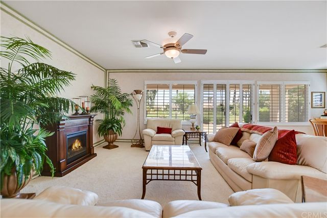 a bedroom with bed and a window