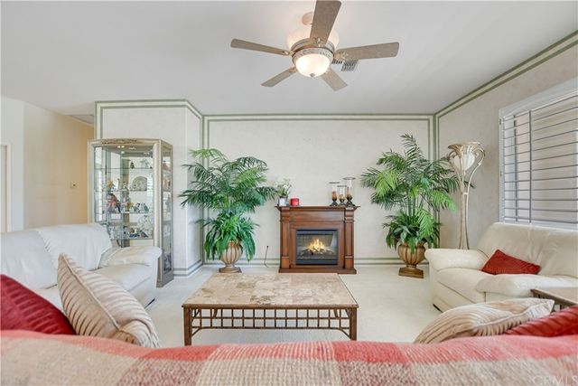 a bedroom with a bed and a table in it