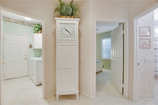 a view of a backyard with sitting area and garden