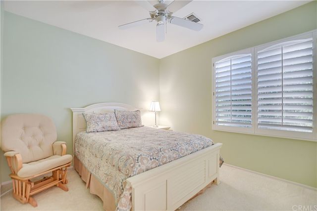 a front view of house with yard and outdoor seating
