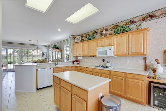 a very nice looking dining room with a large window