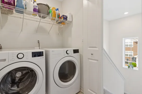 a utility room with dryer and washer