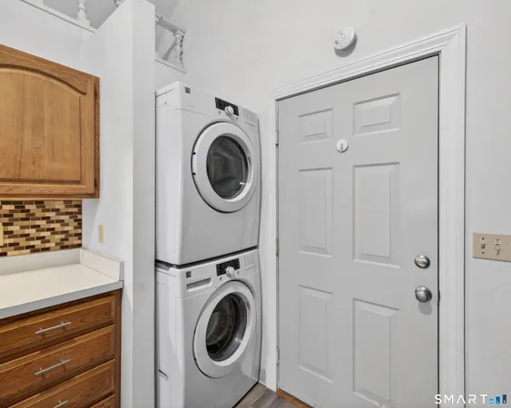 a bathroom with a sink a mirror and a toilet