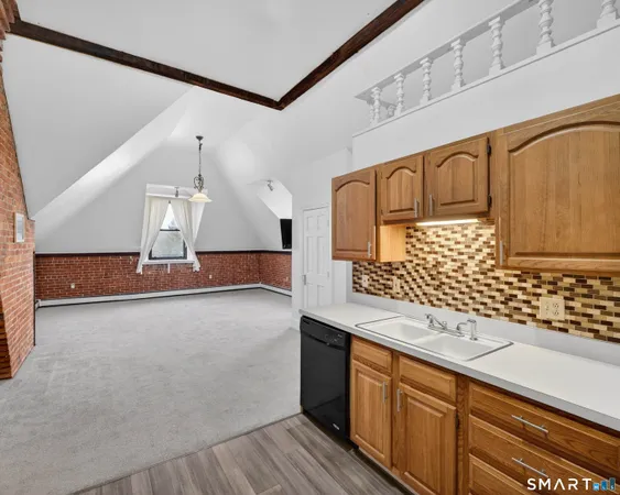 a bathroom with a toilet a sink and a bathtub
