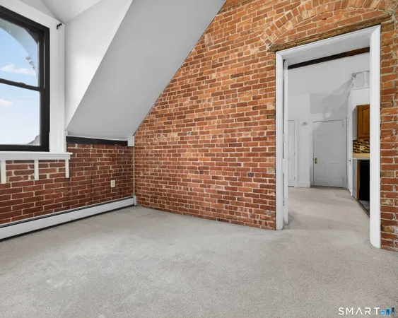 a view of balcony with furniture