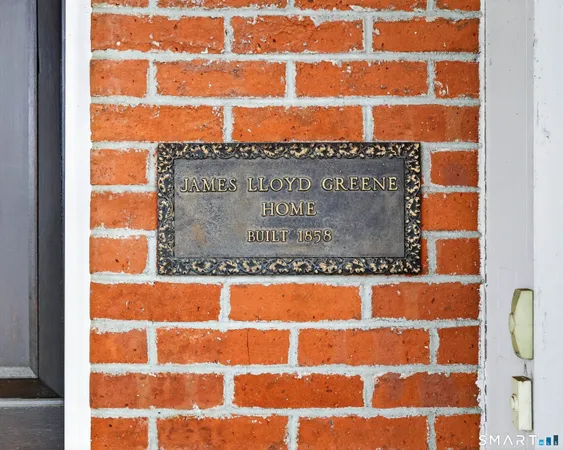 a view of an empty room with stairs