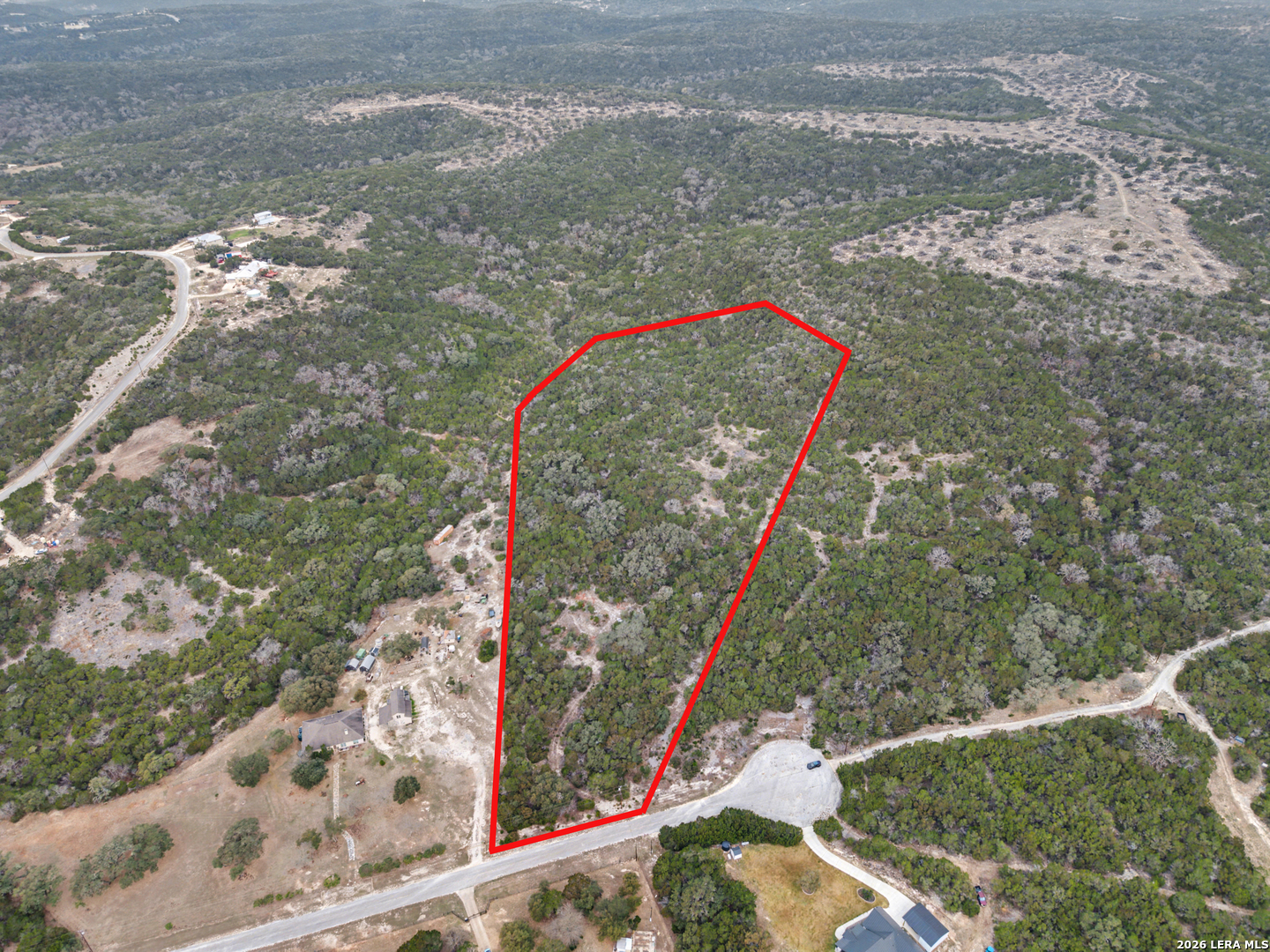 175 County Road 2765 Mico, TX 78056 - Photo 1 of 15 a bird view of a house