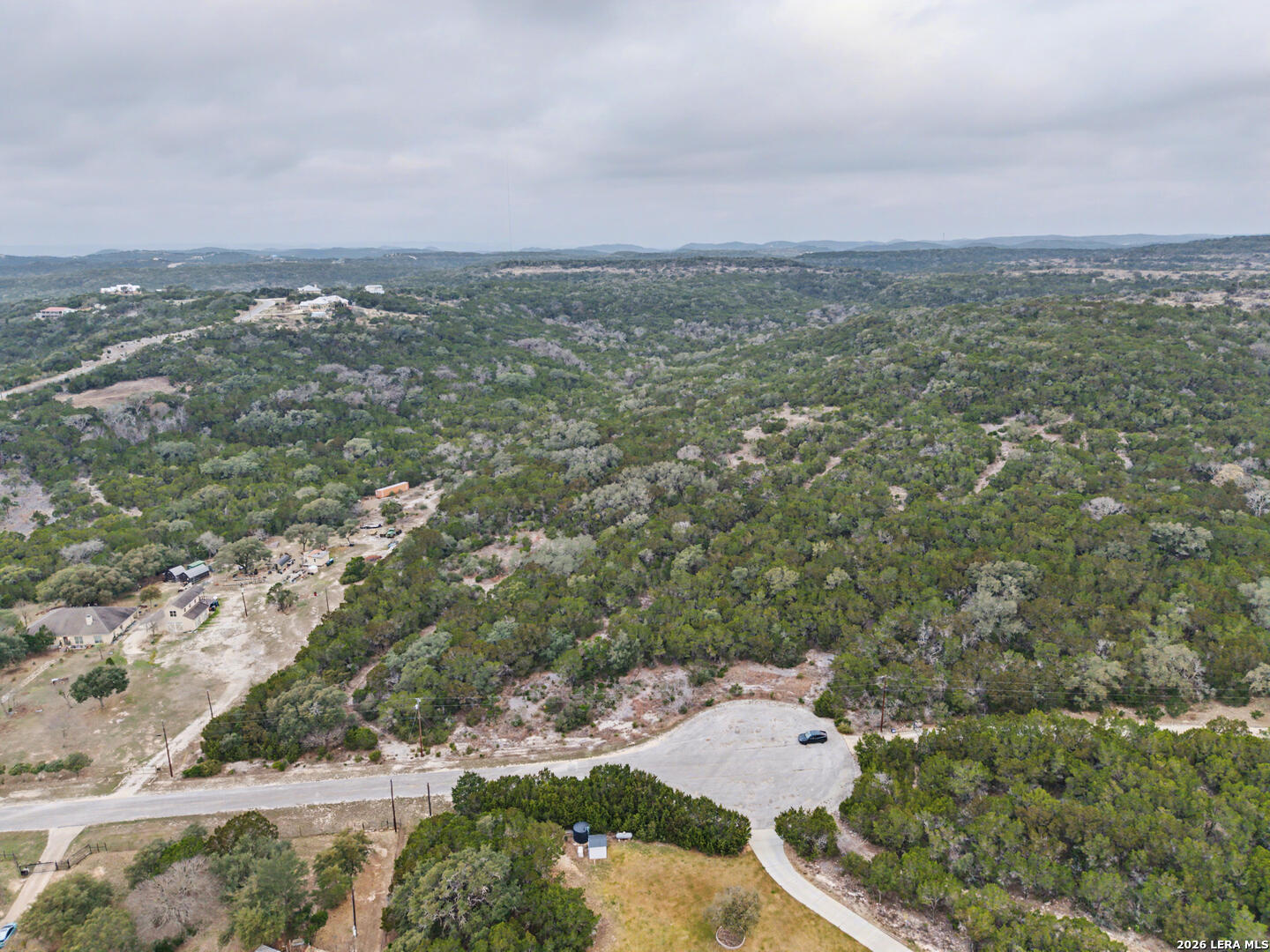 175 County Road 2765 Mico, TX 78056 - Photo 5 of 15 an aerial view of residential houses with outdoor space