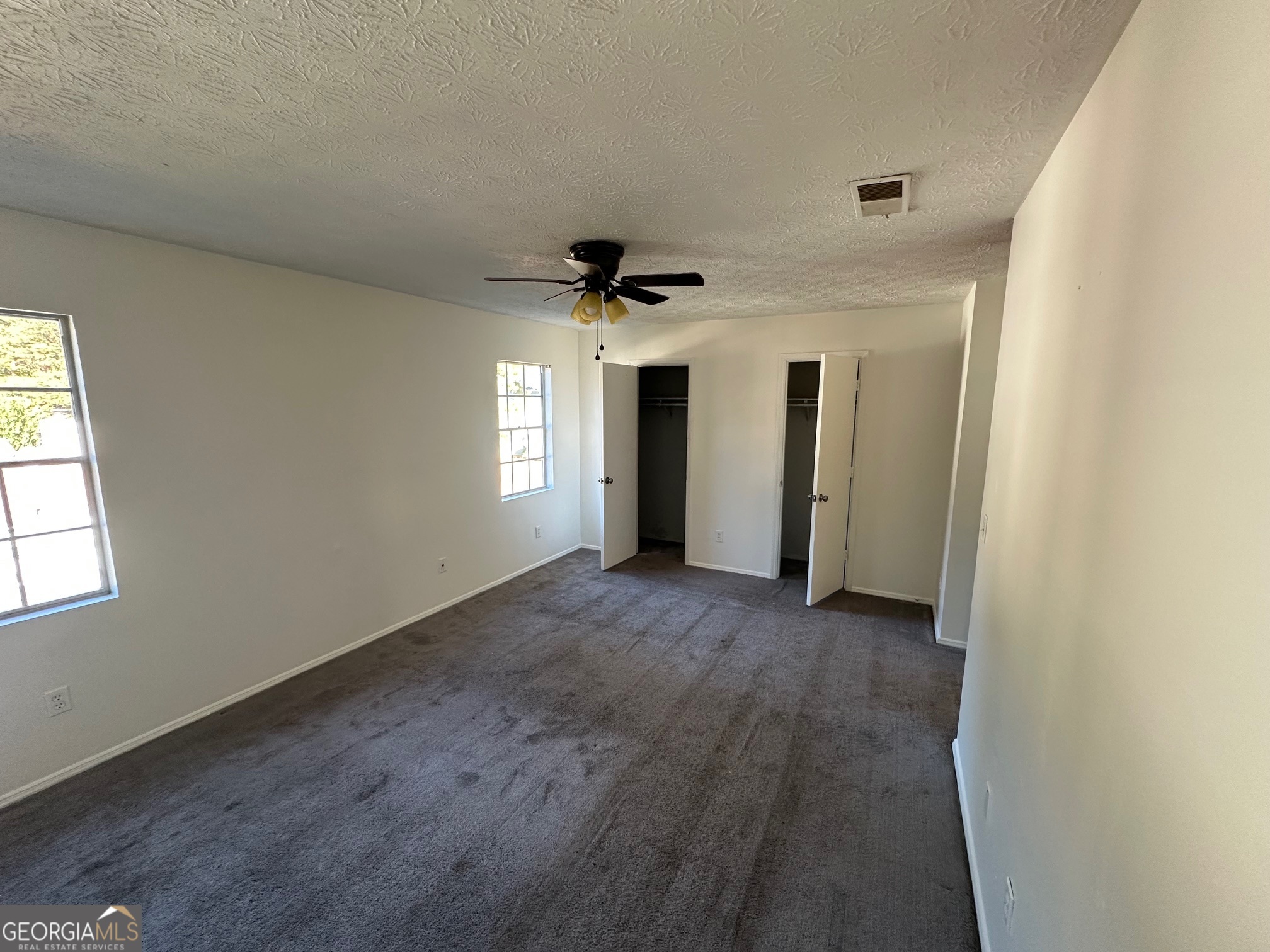 2511 Pine Tree Trail South Fulton, GA 30349 - Photo 18 of 23 an empty room that has a window in it