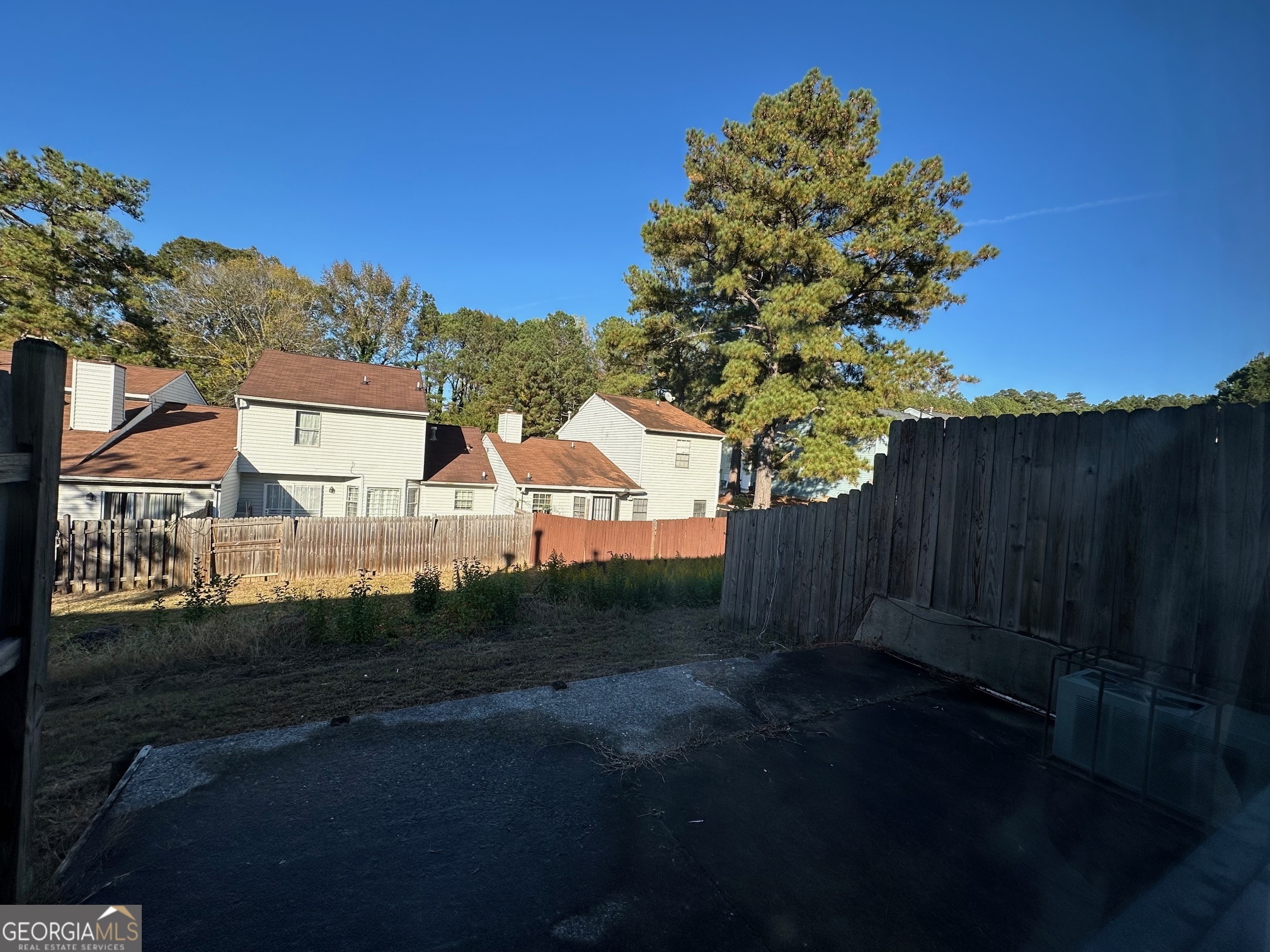 2511 Pine Tree Trail South Fulton, GA 30349 - Photo 23 of 23 a view of a house with a yard