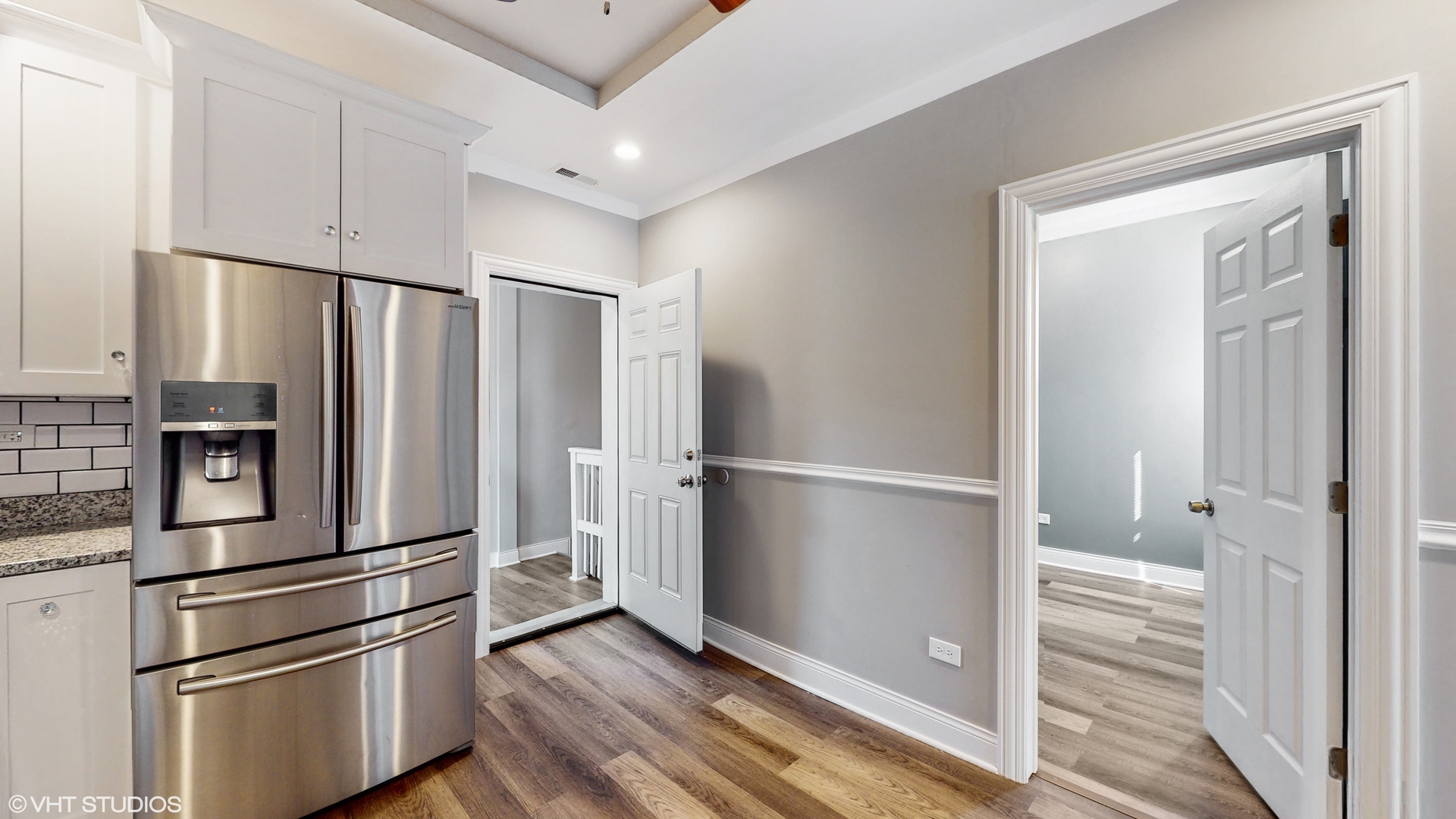 7316 South Peoria Street Chicago, IL 60621 - Photo 16 of 40 a metallic refrigerator freezer and a stove sitting inside of a kitchen