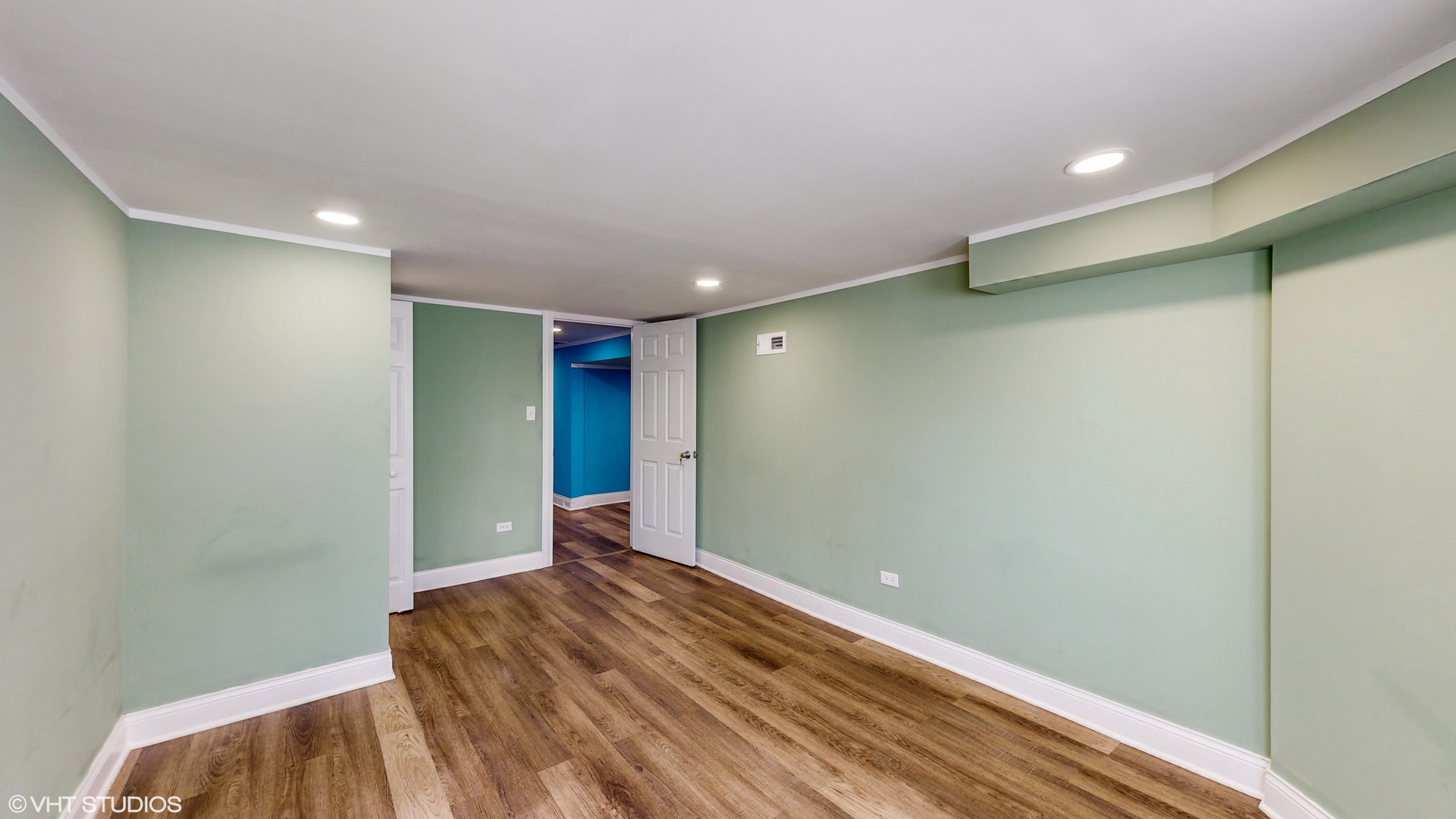 7316 South Peoria Street Chicago, IL 60621 - Photo 27 of 40 a view of room with wooden floor