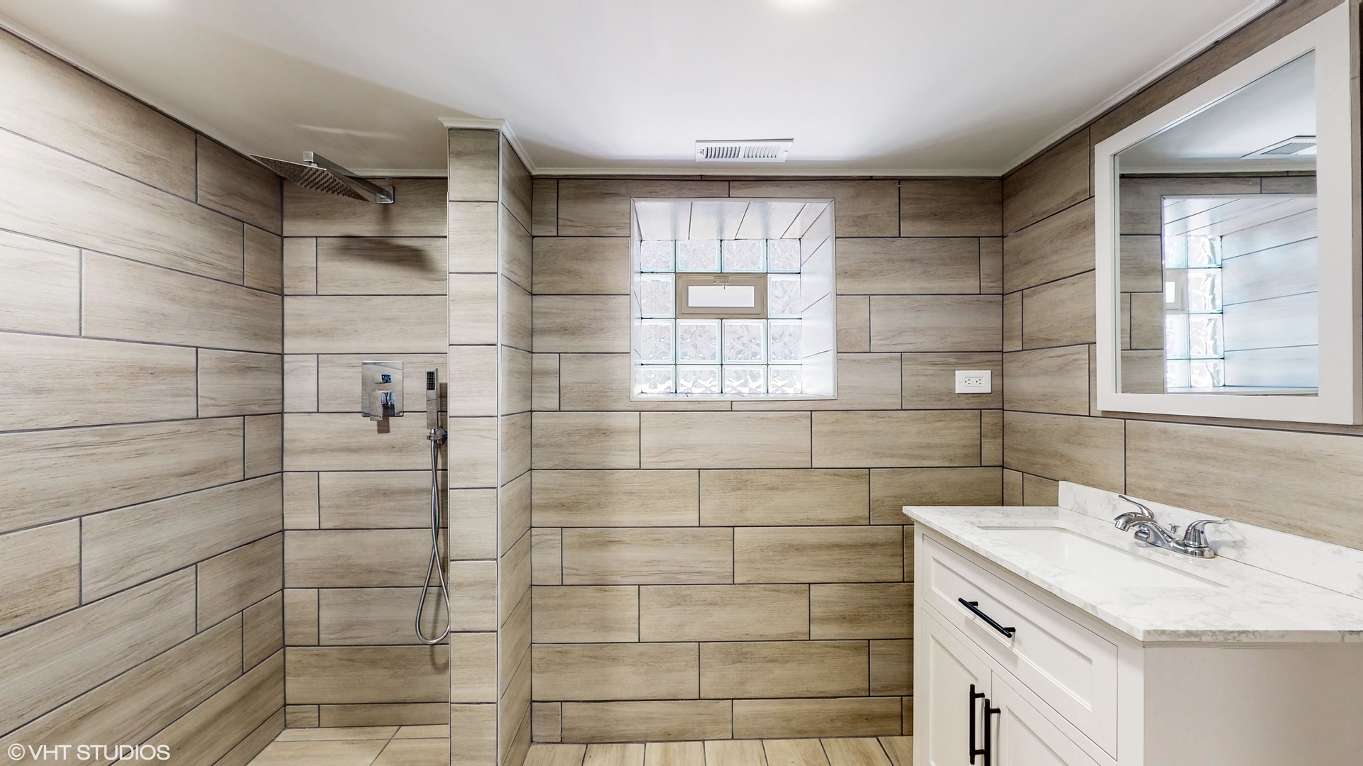 7316 South Peoria Street Chicago, IL 60621 - Photo 28 of 40 a bathroom with a sink shower and a mirror