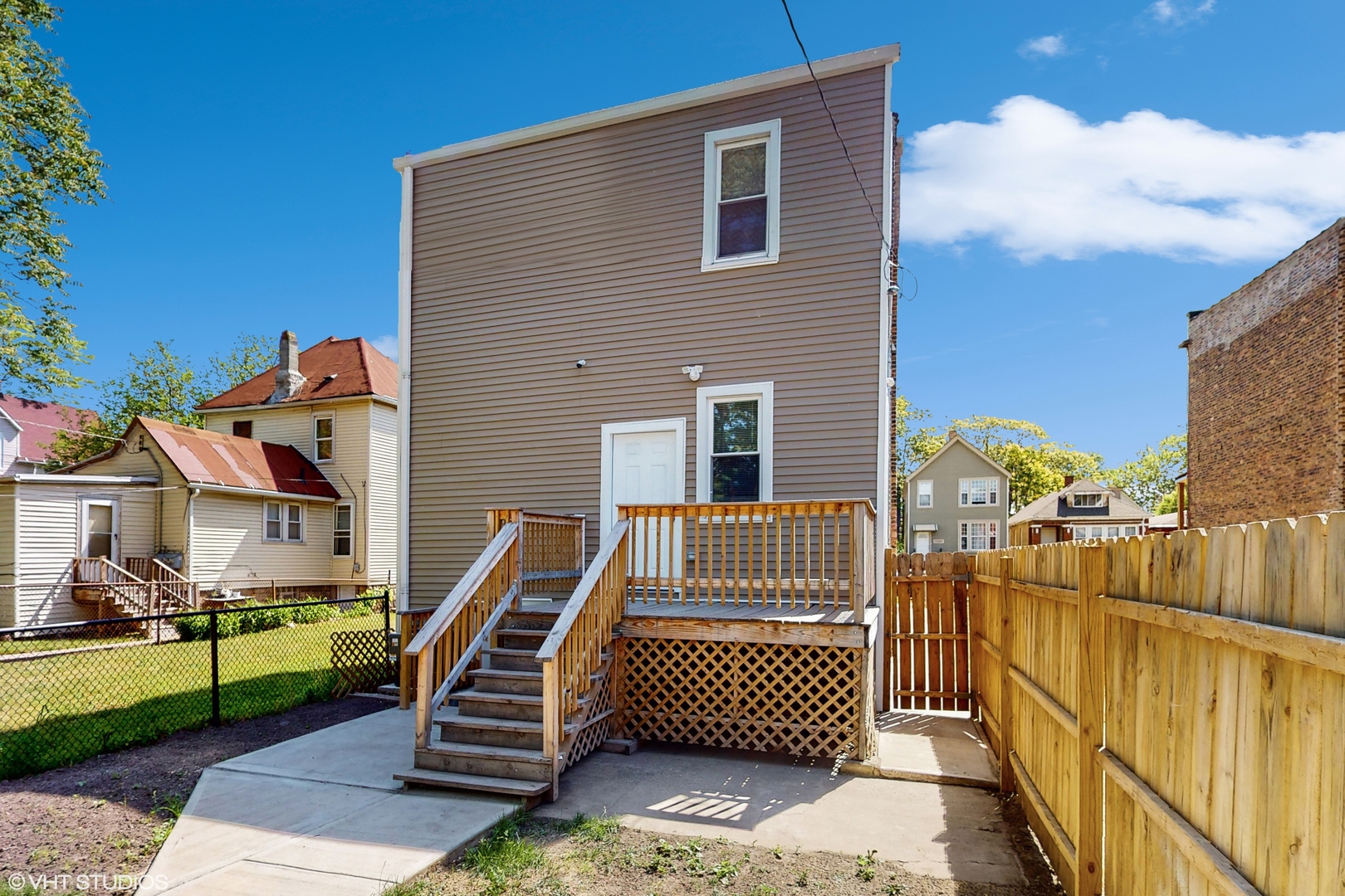 7316 South Peoria Street Chicago, IL 60621 - Photo 34 of 40 a front view of a house with a garden