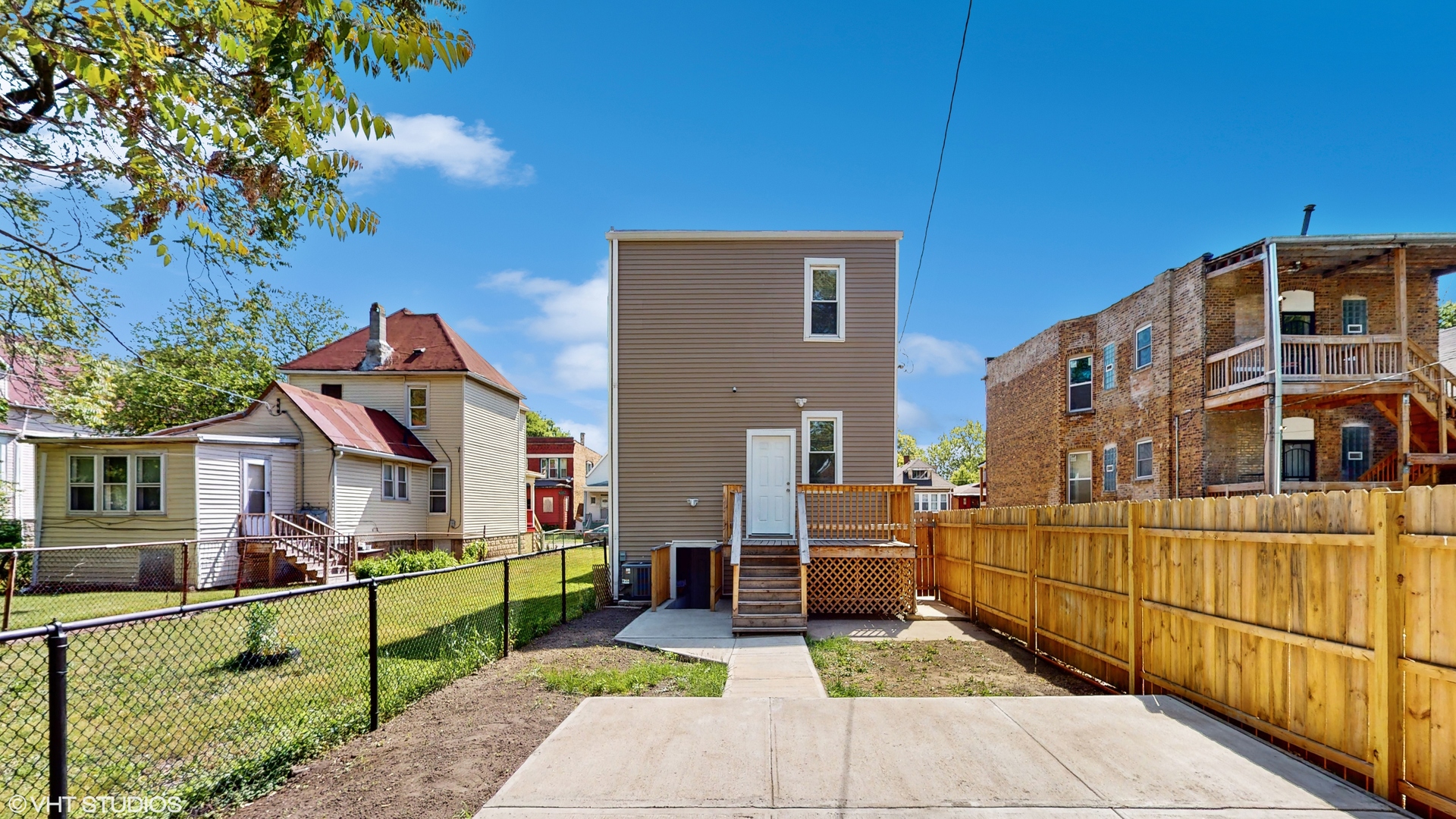 7316 South Peoria Street Chicago, IL 60621 - Photo 36 of 40 a front view of a house with a garden