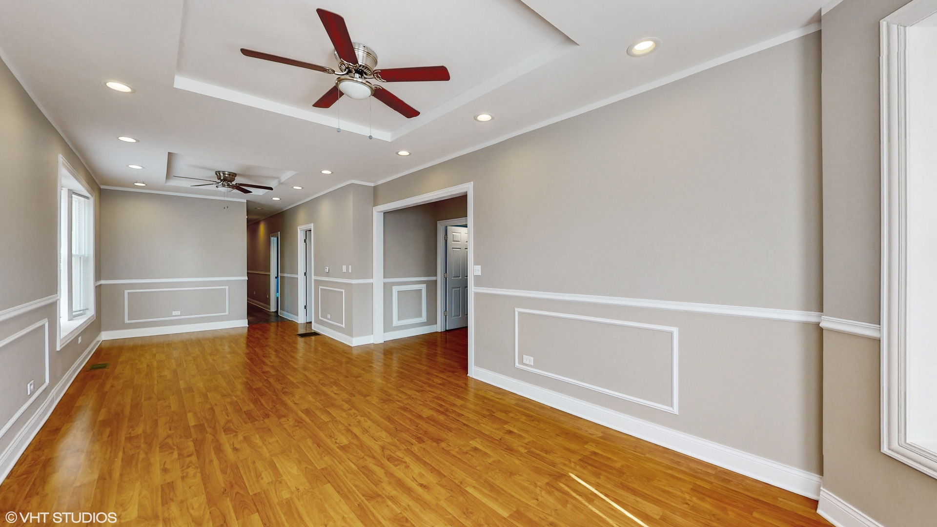 7316 South Peoria Street Chicago, IL 60621 - Photo 4 of 40 a view of an empty room with wooden floor