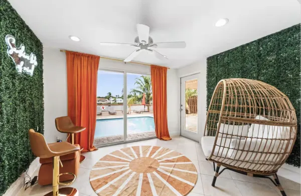 a view of a dining room with furniture window and outside view