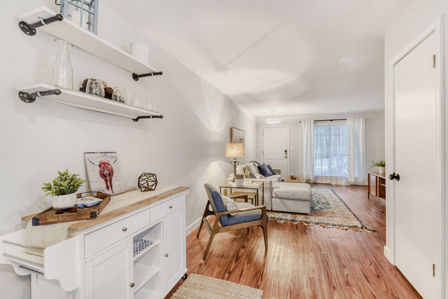 1912 Lightsey Road, Unit 6 Austin, TX 78704 - Photo 10 of 27 a living room with furniture and wooden floor