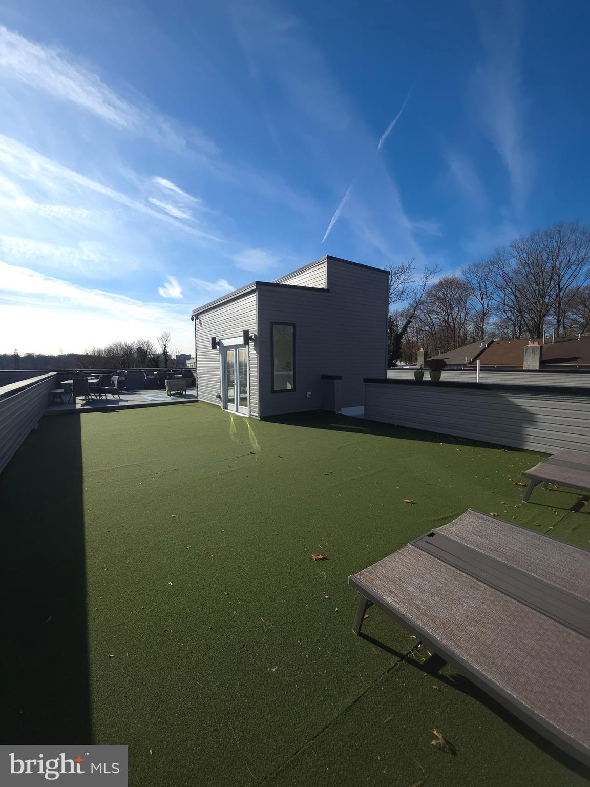 3503 Midvale Avenue, Unit 503 Philadelphia, PA 19129 - Photo 16 of 29 a view of a house with a yard