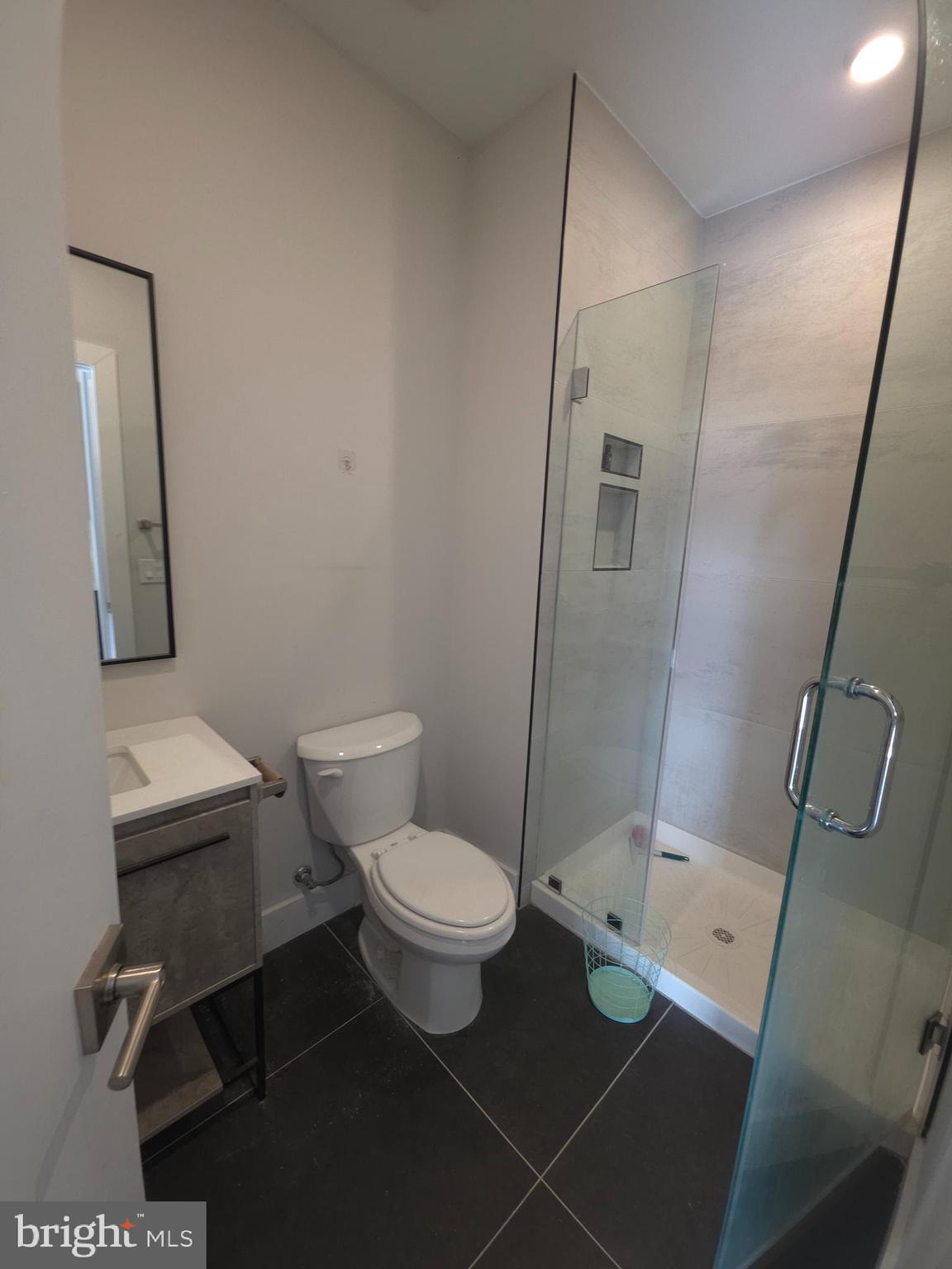 3503 Midvale Avenue, Unit 503 Philadelphia, PA 19129 - Photo 28 of 29 a bathroom with a toilet and a shower