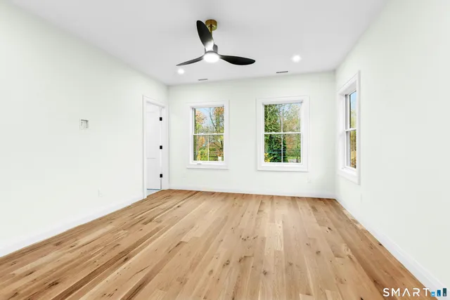 a kitchen with a sink cabinets and a window
