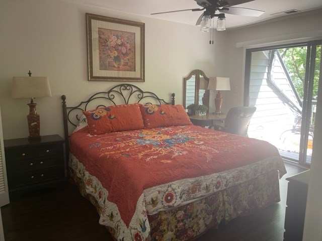 637 Riverside Drive Ellijay, GA 30540 - Photo 7 of 17 a bedroom with a bed and a painting on the wall