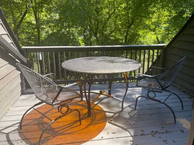637 Riverside Drive Ellijay, GA 30540 - Photo 8 of 17 a view of a balcony with furniture
