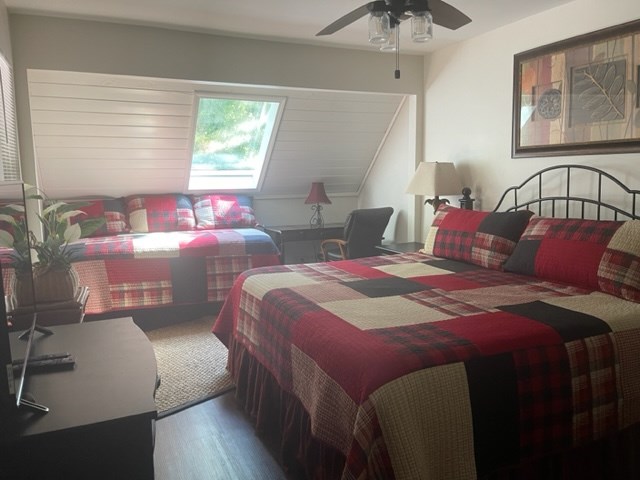 637 Riverside Drive Ellijay, GA 30540 - Photo 9 of 17 a bedroom with bed and window