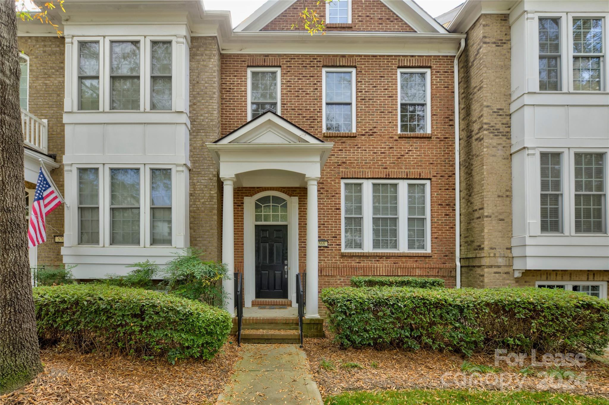 568 6th Baxter Crossing Fort Mill, SC 29708 - Photo 2 of 48 a front view of a house with a yard