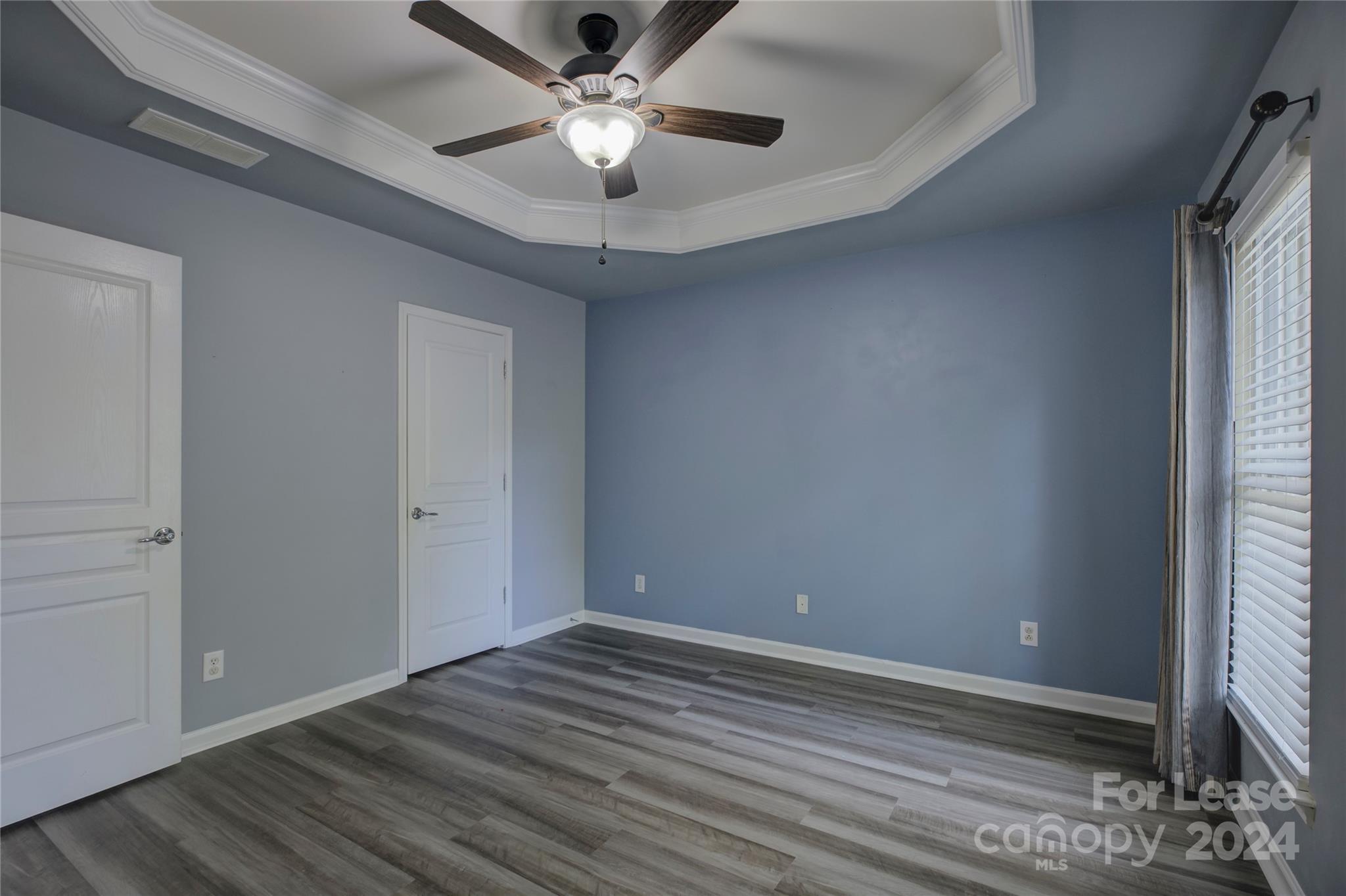 568 6th Baxter Crossing Fort Mill, SC 29708 - Photo 26 of 48 wooden floor in an empty room with a window